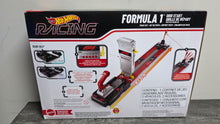 Load image into Gallery viewer, Hot Wheels Racing Formula 1 Grid Start Track Set and 2 Die-Cast F1 Cars in 1:64 Scale